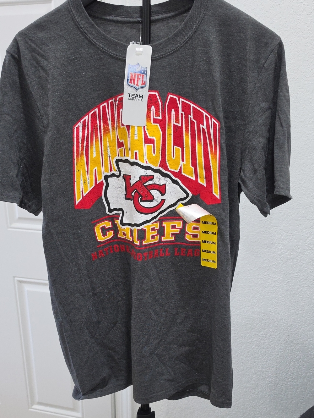 NFL Kansas City Chiefs Charcoal Graphic Tee with Red and Yellow Logo